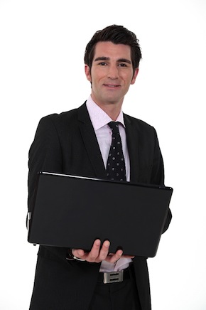 Man holding a laptop computer